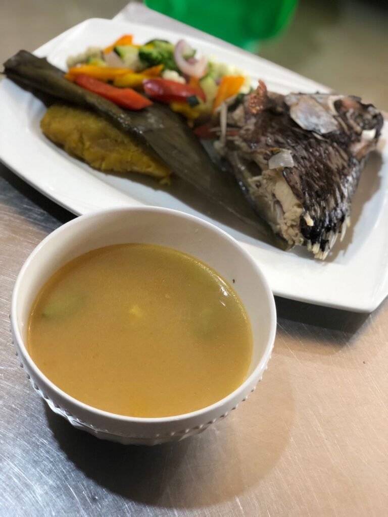 A plate of boiled fish, a savory and delectable dish, part of the menu offerings at Irman Restaurant and Cafe.